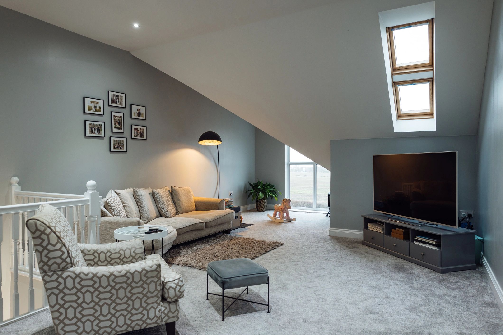 Bright modern living room with clean white walls and a finished, professional look